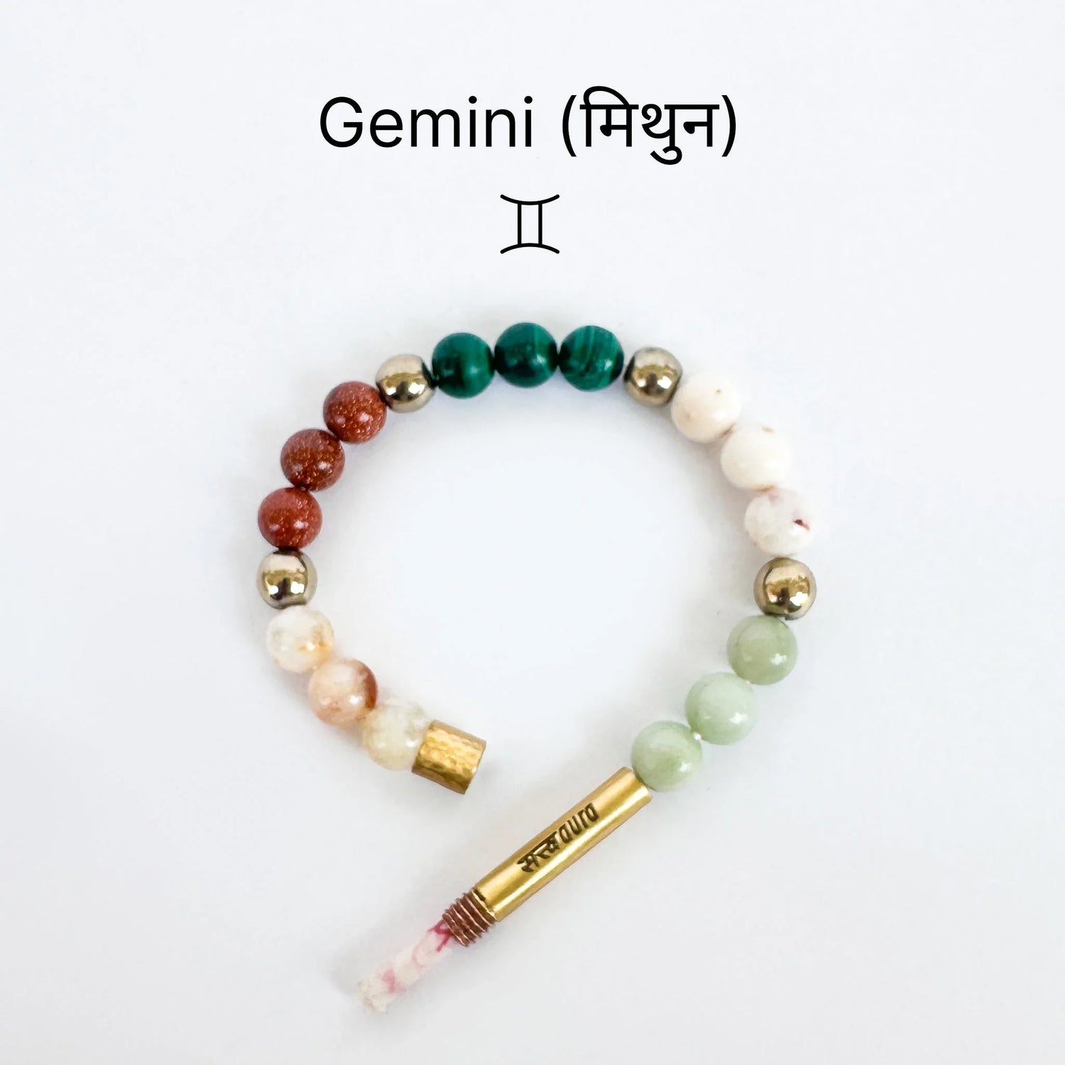 Gemini zodiac beaded bracelet with colorful stones and Hindi inscription on white background